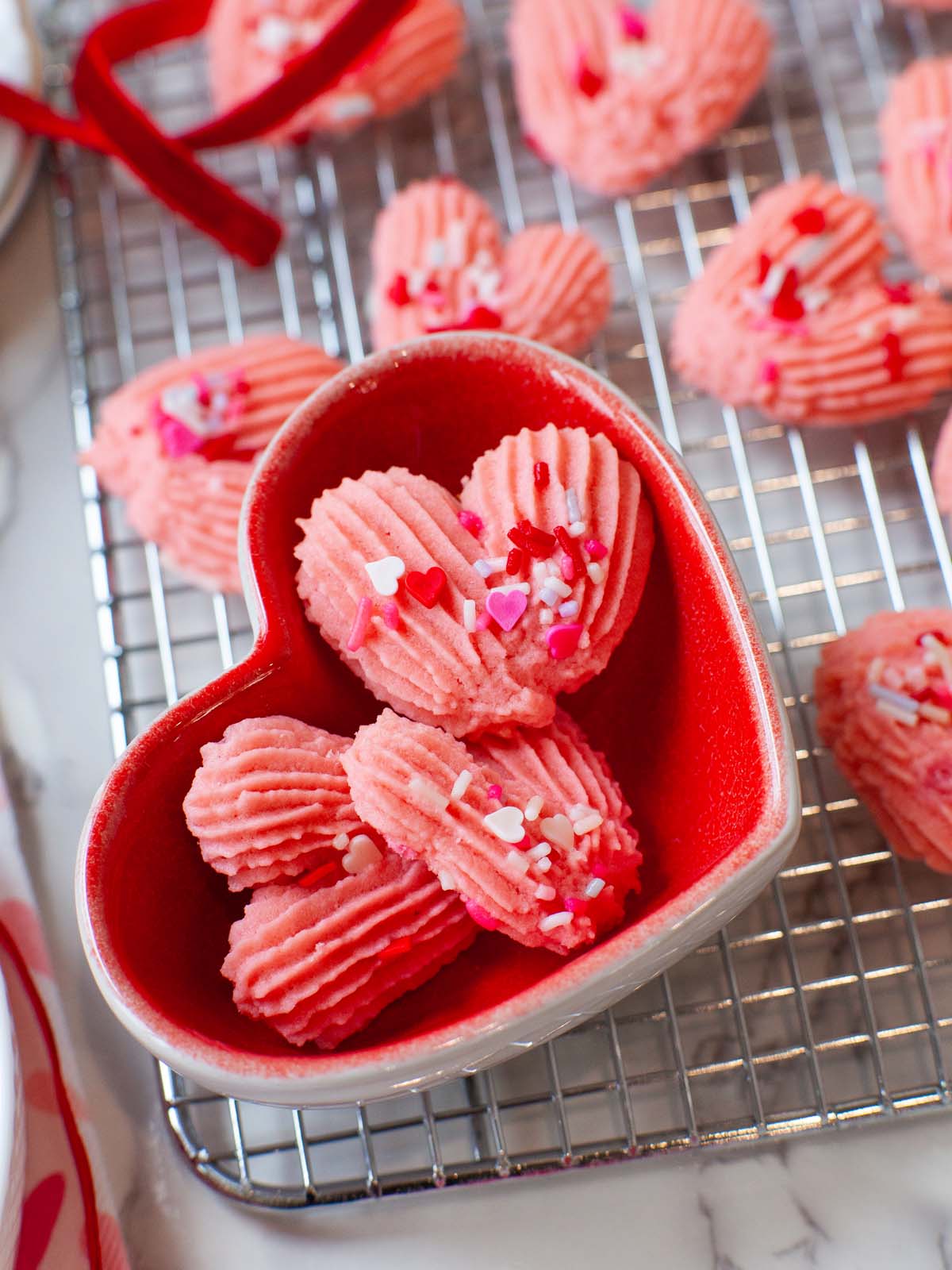 A closeup image of heart-shaped cookies instead a heart-shaped bowl.